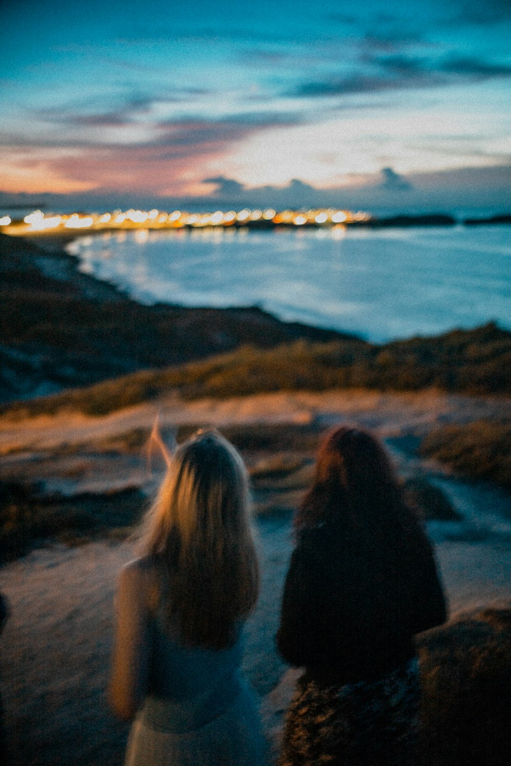 a couple of women standing next to each other