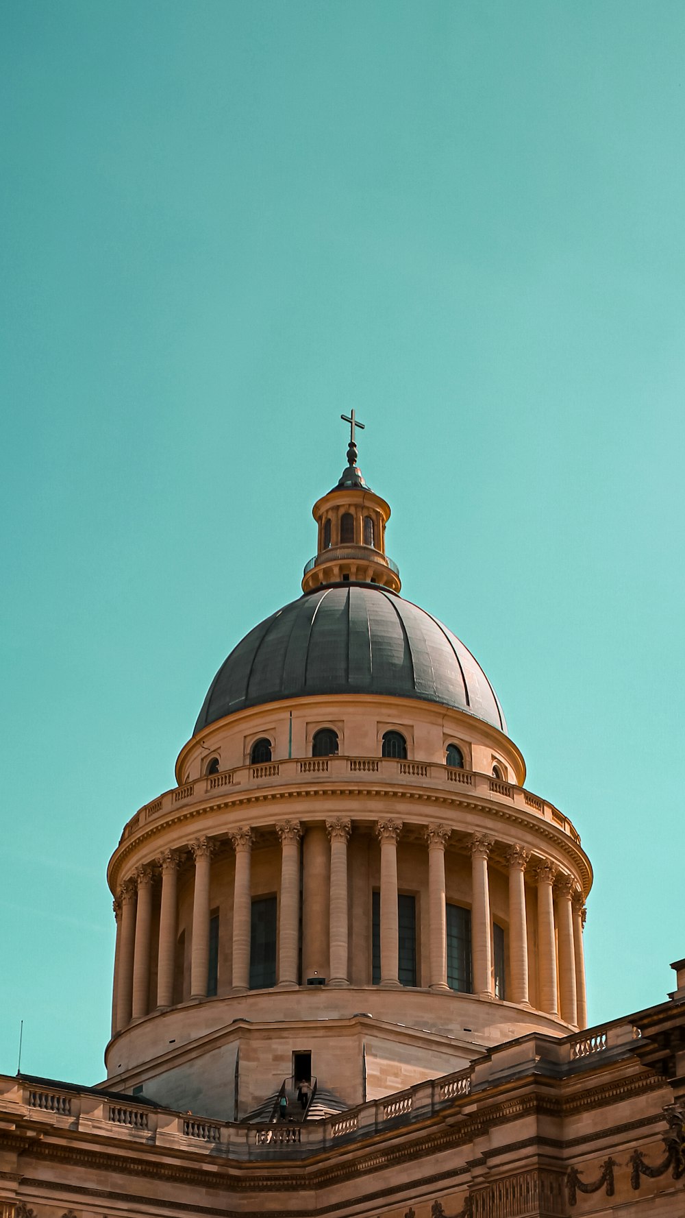 the dome of a building with a cross on top