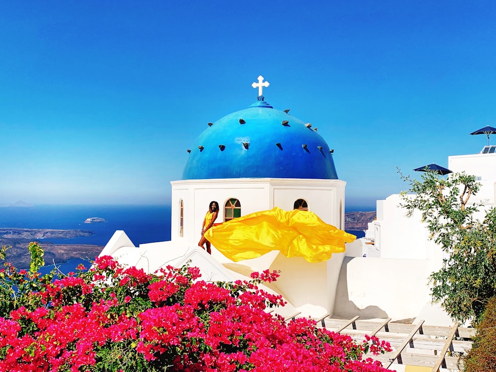 a blue dome with a cross on top of it