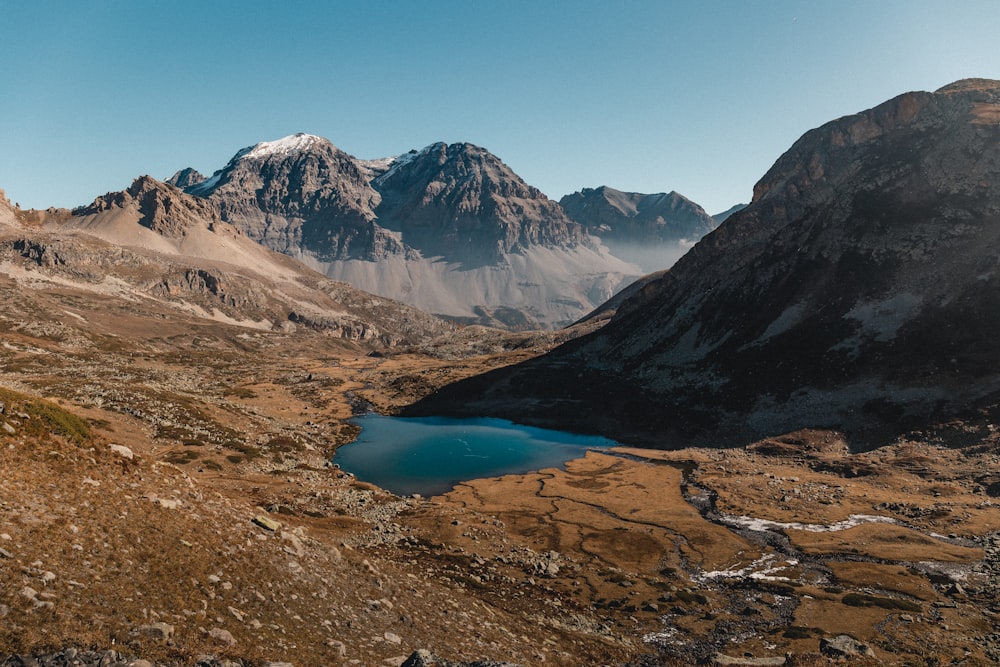 a mountain range with a lake in the middle