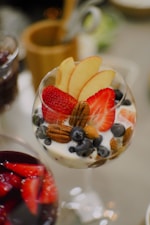 a bowl of yogurt with fruit and nuts