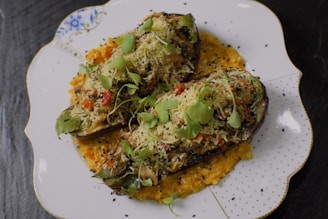 a white plate topped with food on top of a table