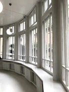 Aluminum window frames installed in a bright living room.