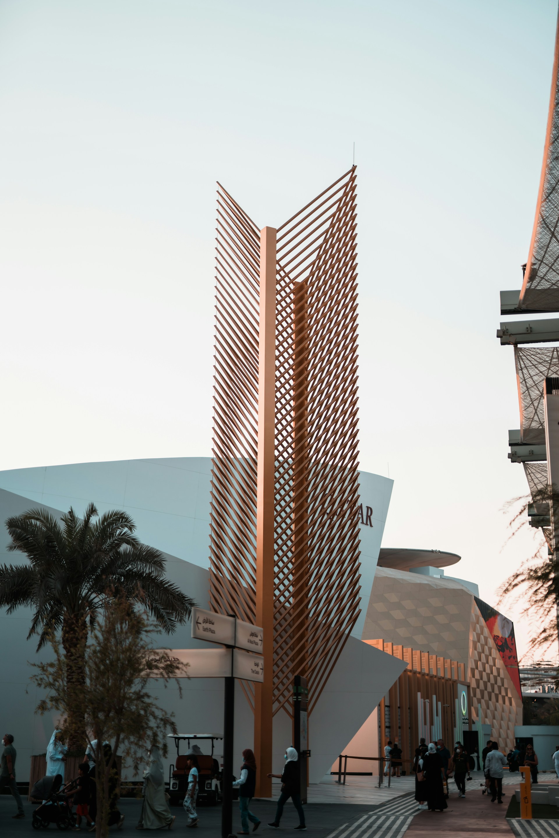 a building that has a lot of people walking around it