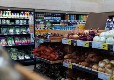 a grocery store filled with lots of fresh produce