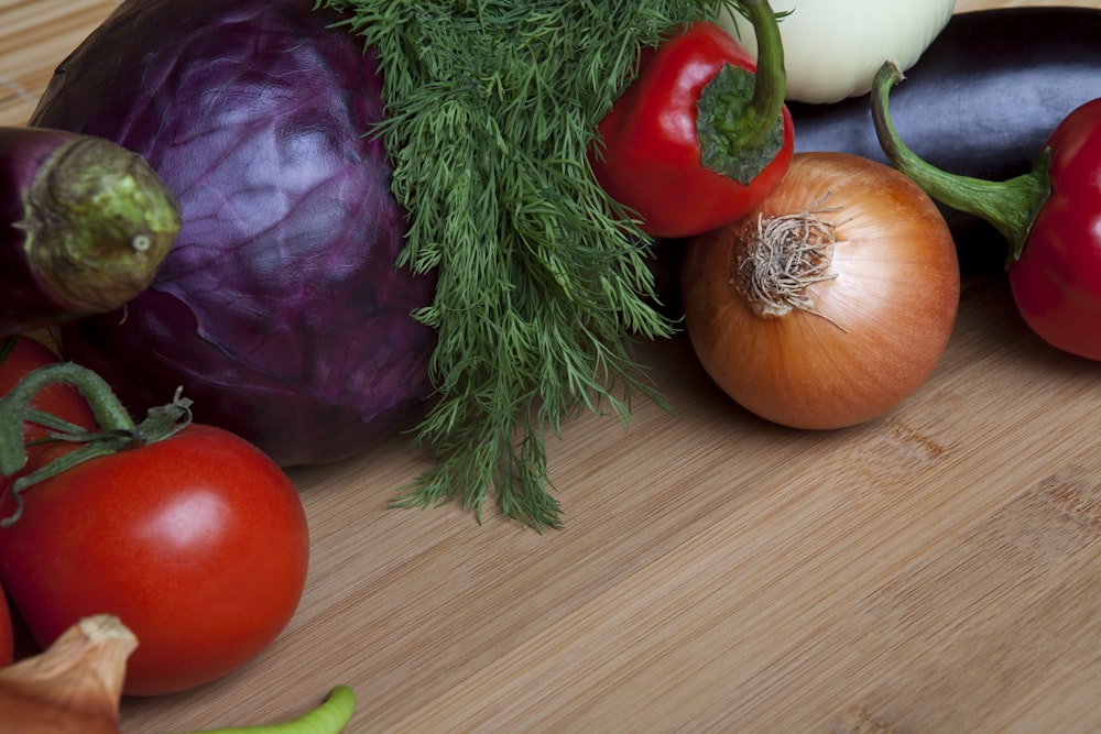 a bunch of different types of vegetables on a table