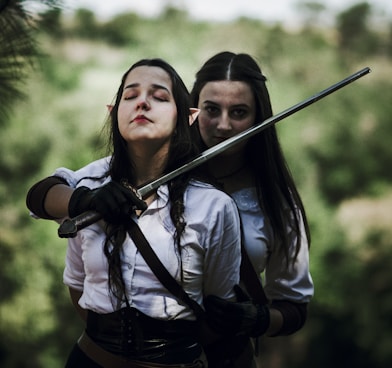 a couple of women standing next to each other