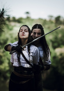 a couple of women standing next to each other