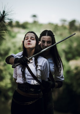 a couple of women standing next to each other