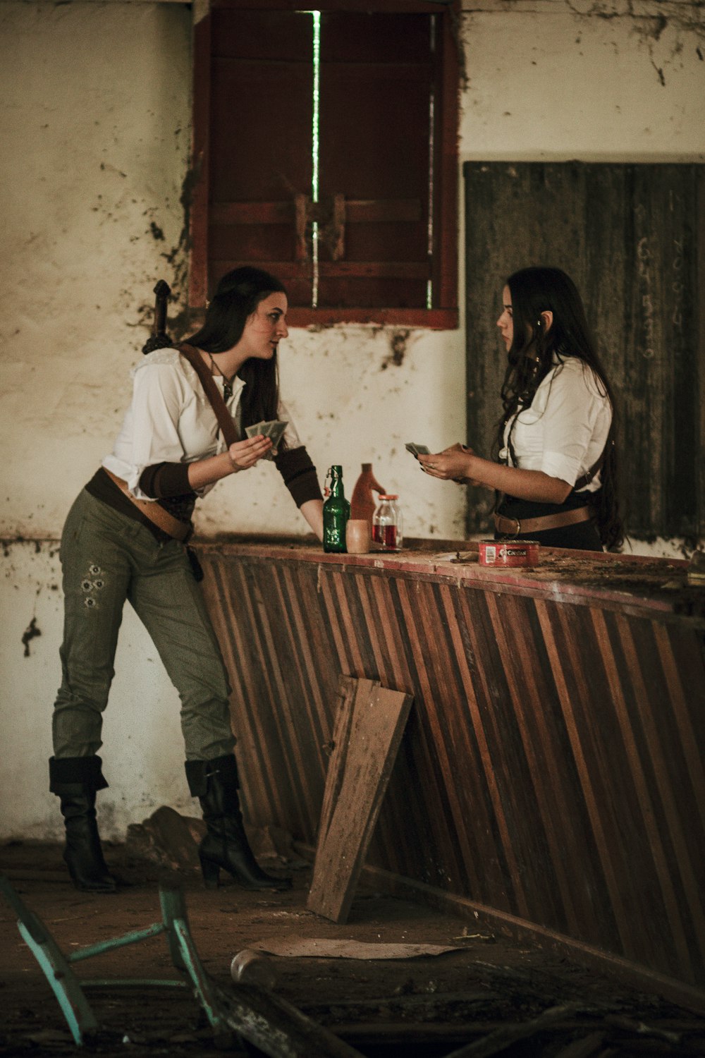 a couple of women standing next to each other