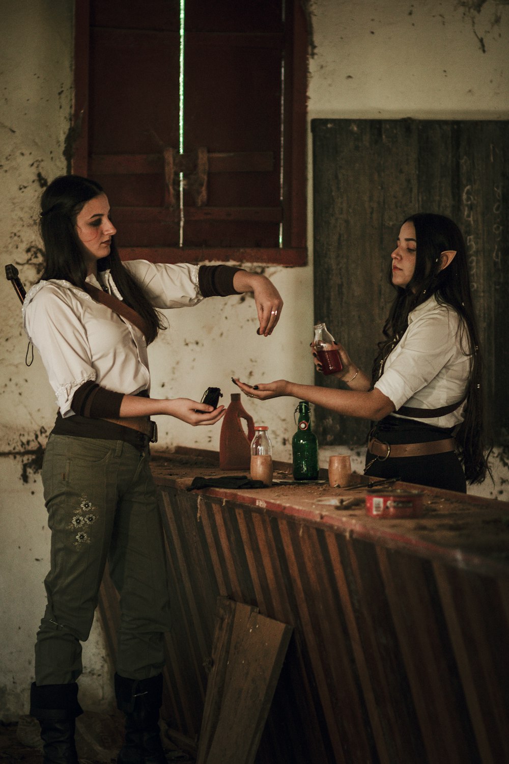 a couple of women standing next to each other