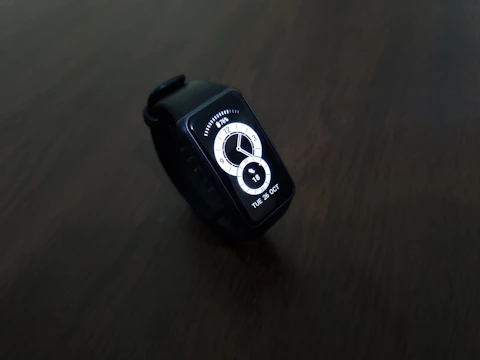 A sleek stopwatch overlaying a clean white background with red accents, symbolizing quick publishing.