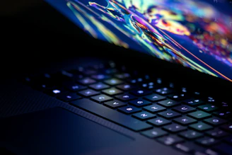 a close up of a laptop computer keyboard