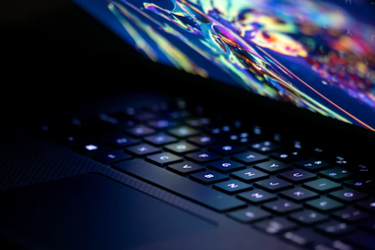 a close up of a laptop computer keyboard