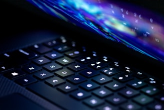 a close up of a laptop computer keyboard