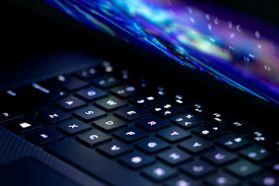 a close up of a laptop computer keyboard