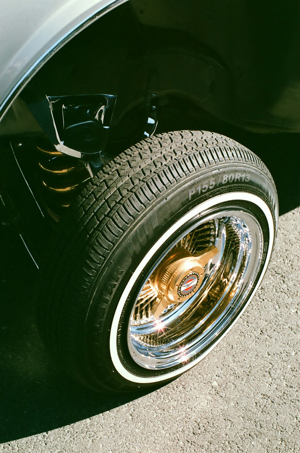 a close up of a tire on a car