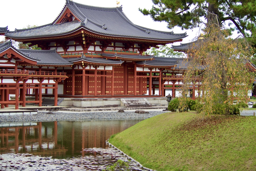 a large building sitting next to a body of water