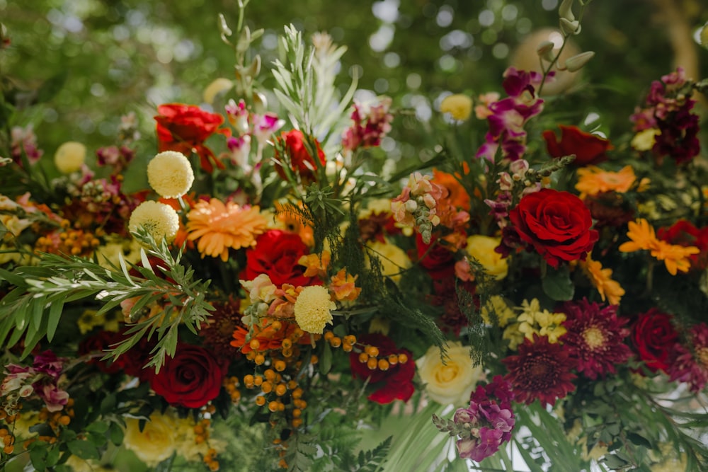 a bunch of flowers that are on a table