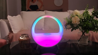 A vibrant RGB lamp illuminating a cozy living space.