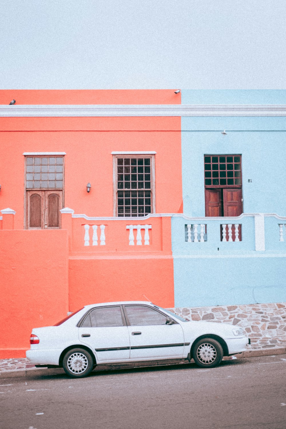 a car parked in front of a building