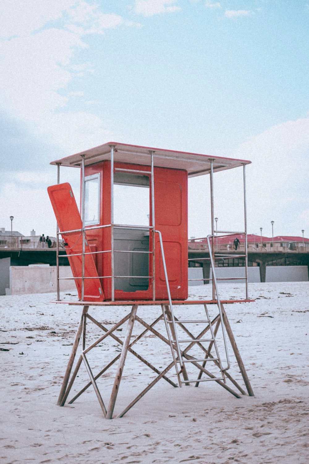 a chair sitting in front of a body of water