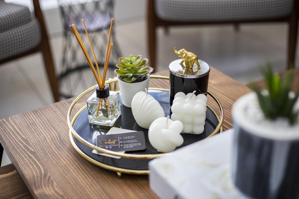 a cup of coffee sitting on top of a wooden table