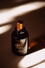 a bottle of shampoo sitting on a table