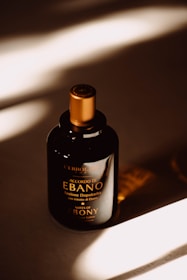 a bottle of shampoo sitting on a table