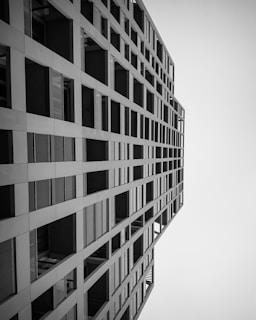 a black and white photo of a tall building