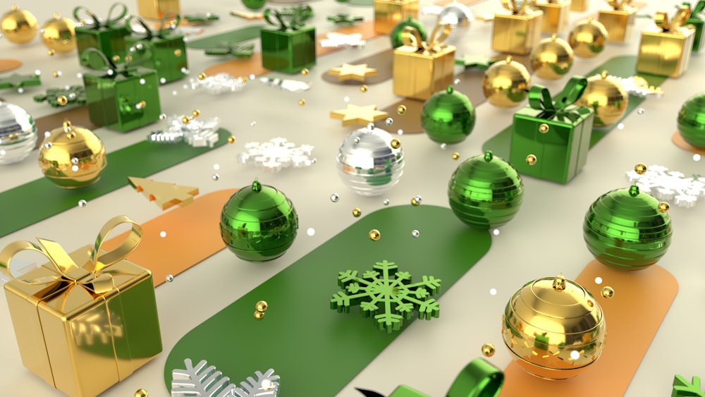 a bunch of green and gold christmas ornaments