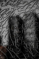 a close up of a broken glass window