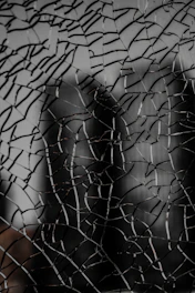 a close up of a broken glass window