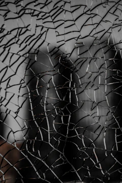 a close up of a broken glass window