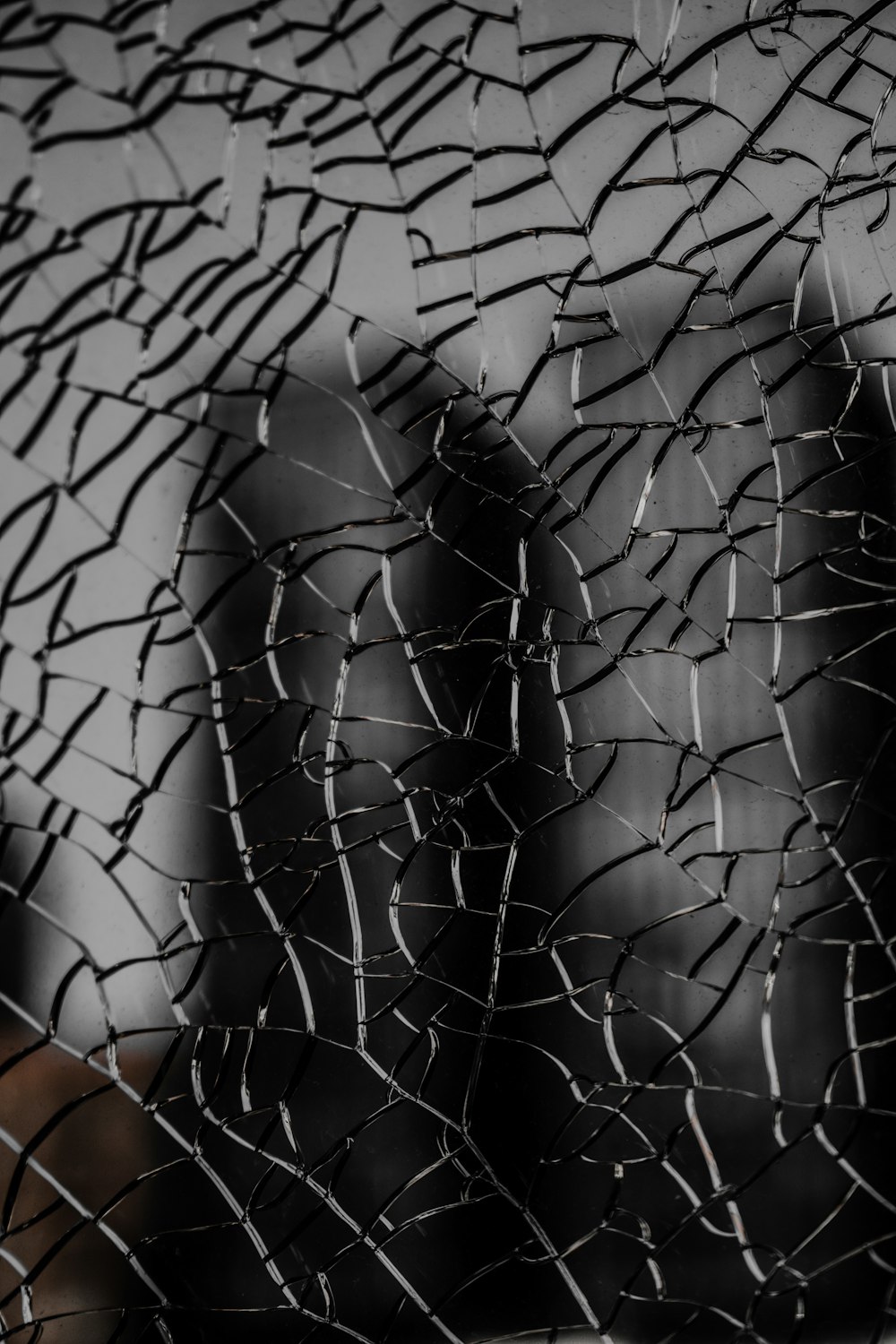 A close up of a broken glass window photo – Free Grey Image on Unsplash
