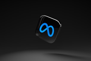 a black square with a blue logo on it