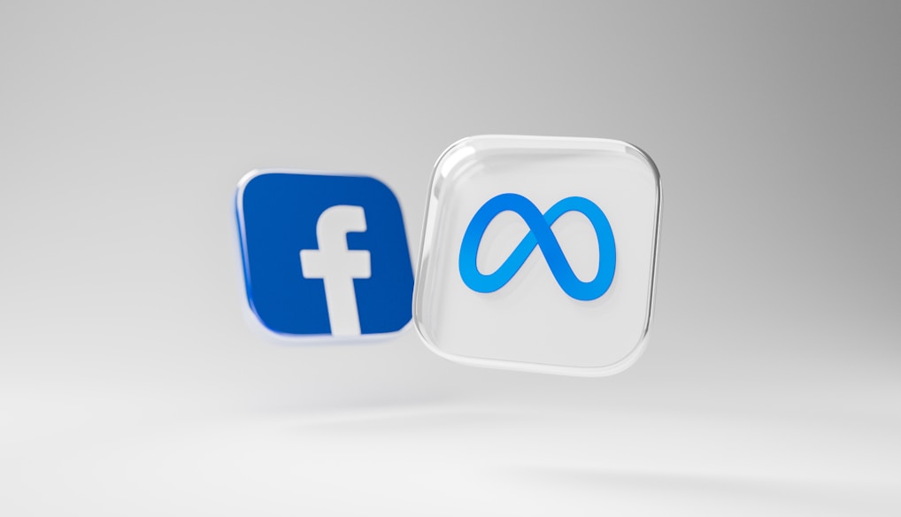 a white and blue square with a blue and white facebook logo