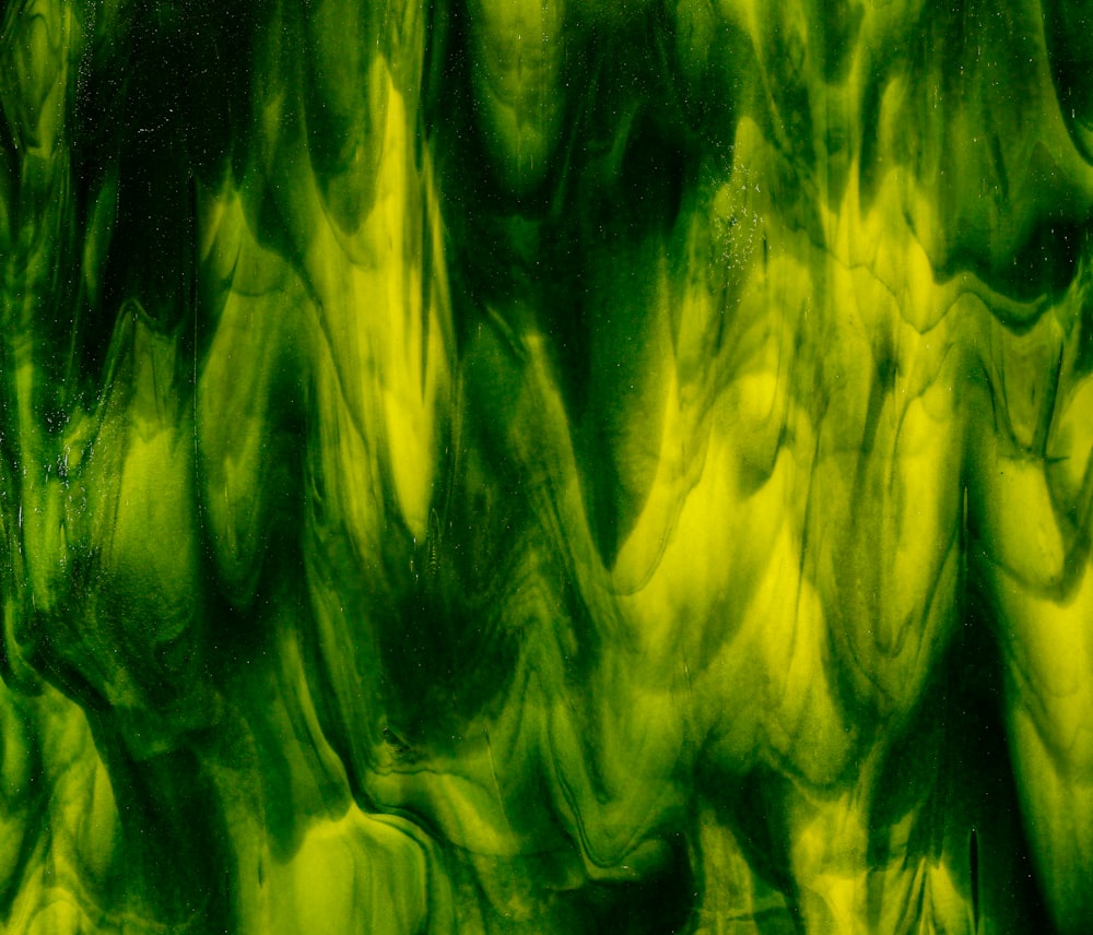 a close up of a green and black substance