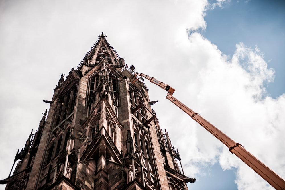 a tall tower with a clock on the top of it