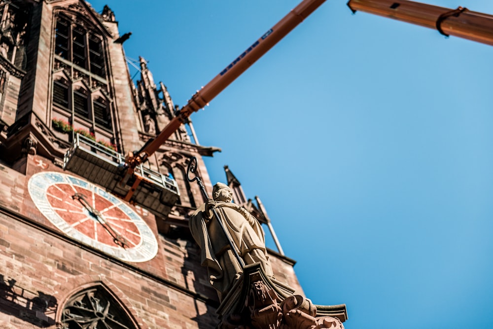 a tall clock tower with a sky background