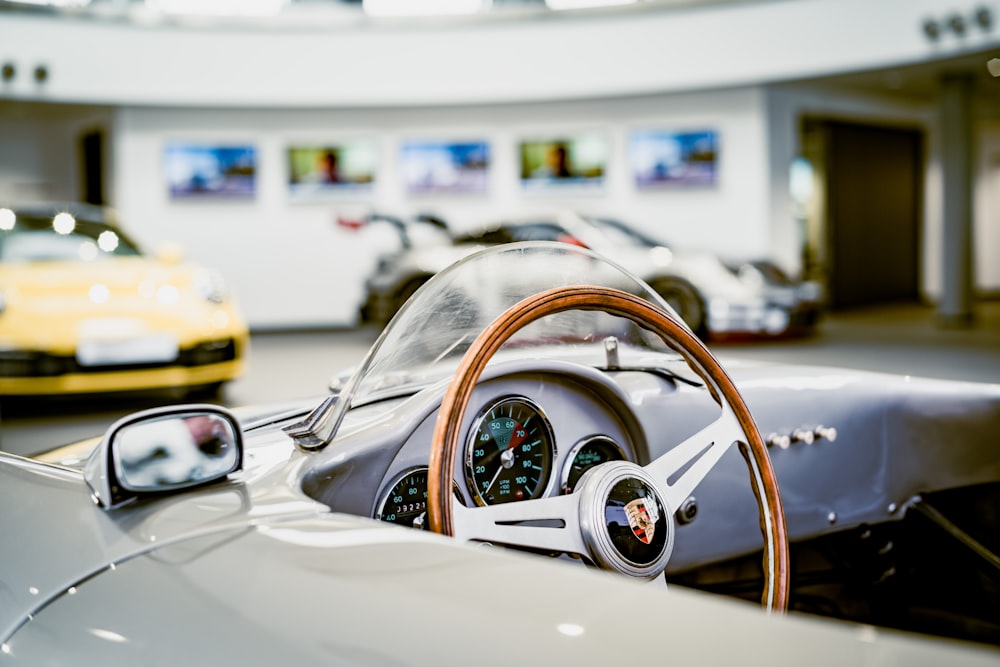 a close up of a steering wheel on a sports car