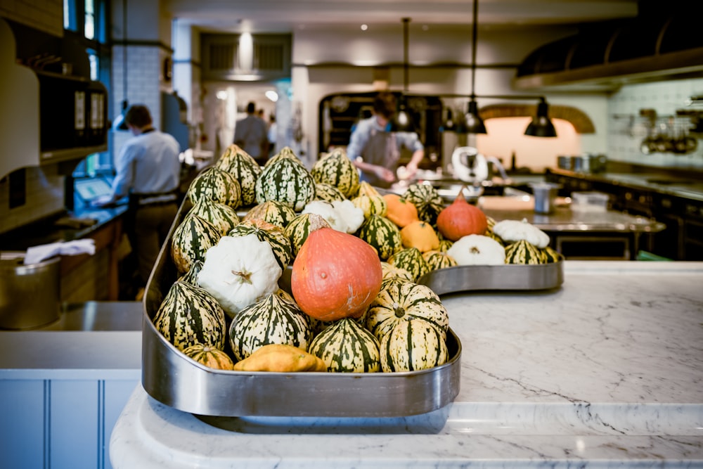 a bunch of fruit is sitting on a counter