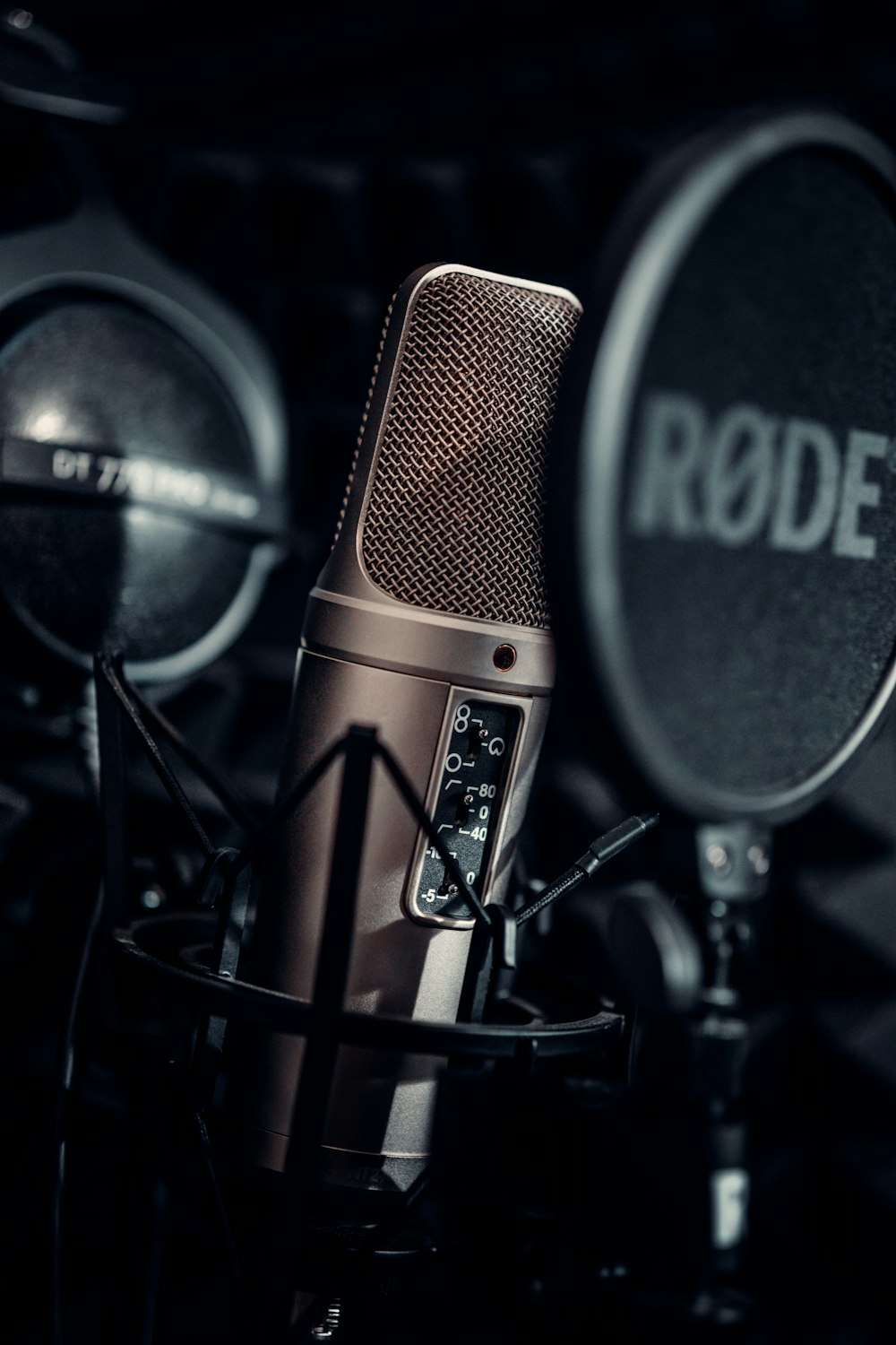 a close up of a microphone in a recording studio