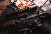 a close up of a rifle on a table