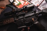 a close up of a rifle on a table