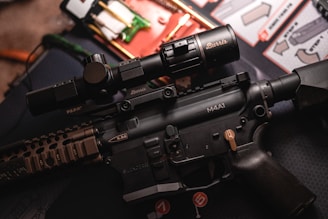 a close up of a rifle on a table