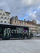 Electric buses charging at a sustainable mobility hub.