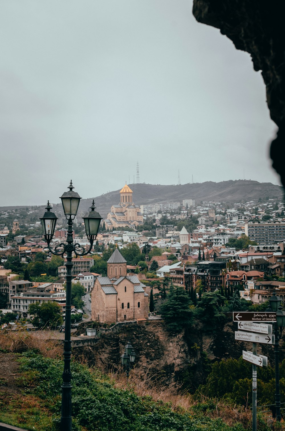 a view of a city from a hill