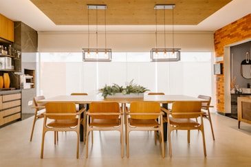 a kitchen with a dining room table