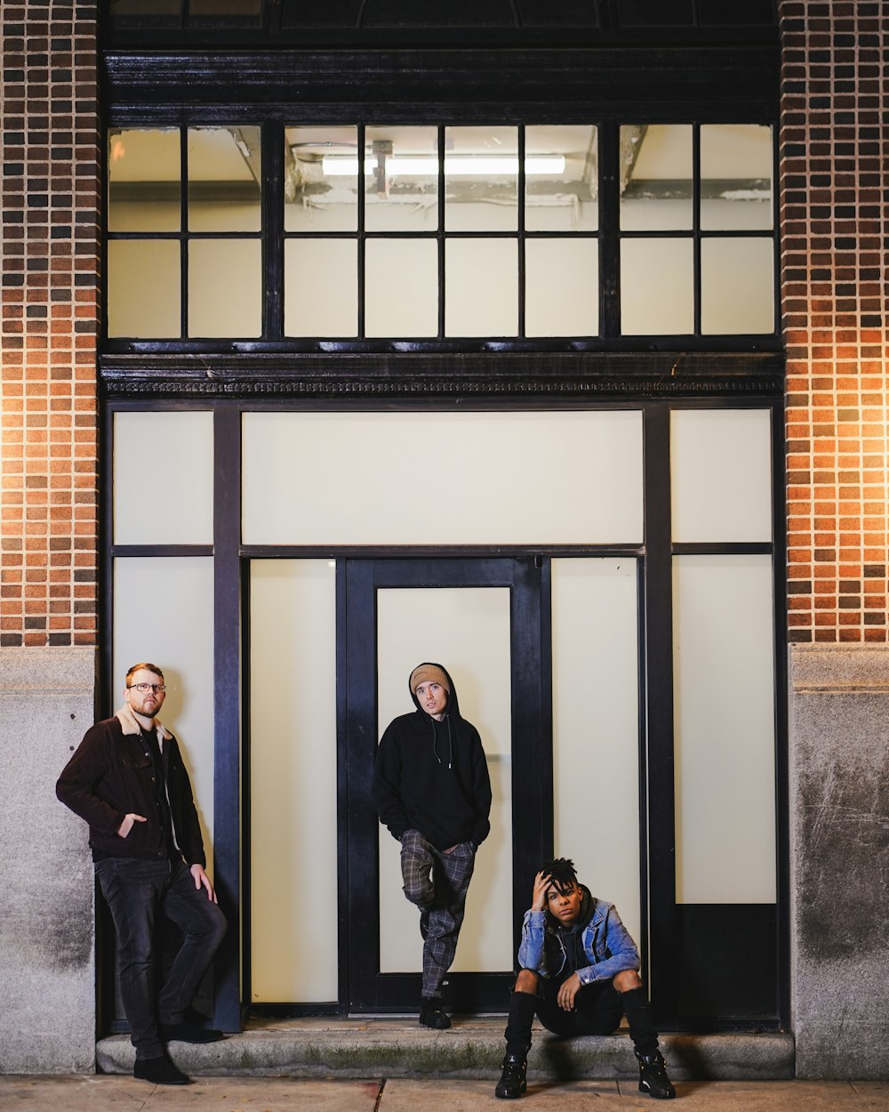 a group of people standing in front of a building